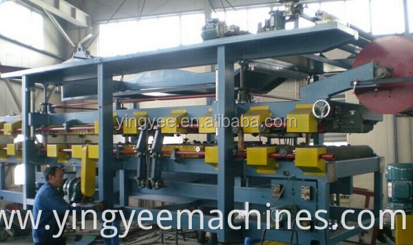 Hebei China auto sandwich panel production line/pu foam sandwich wall panel making machine